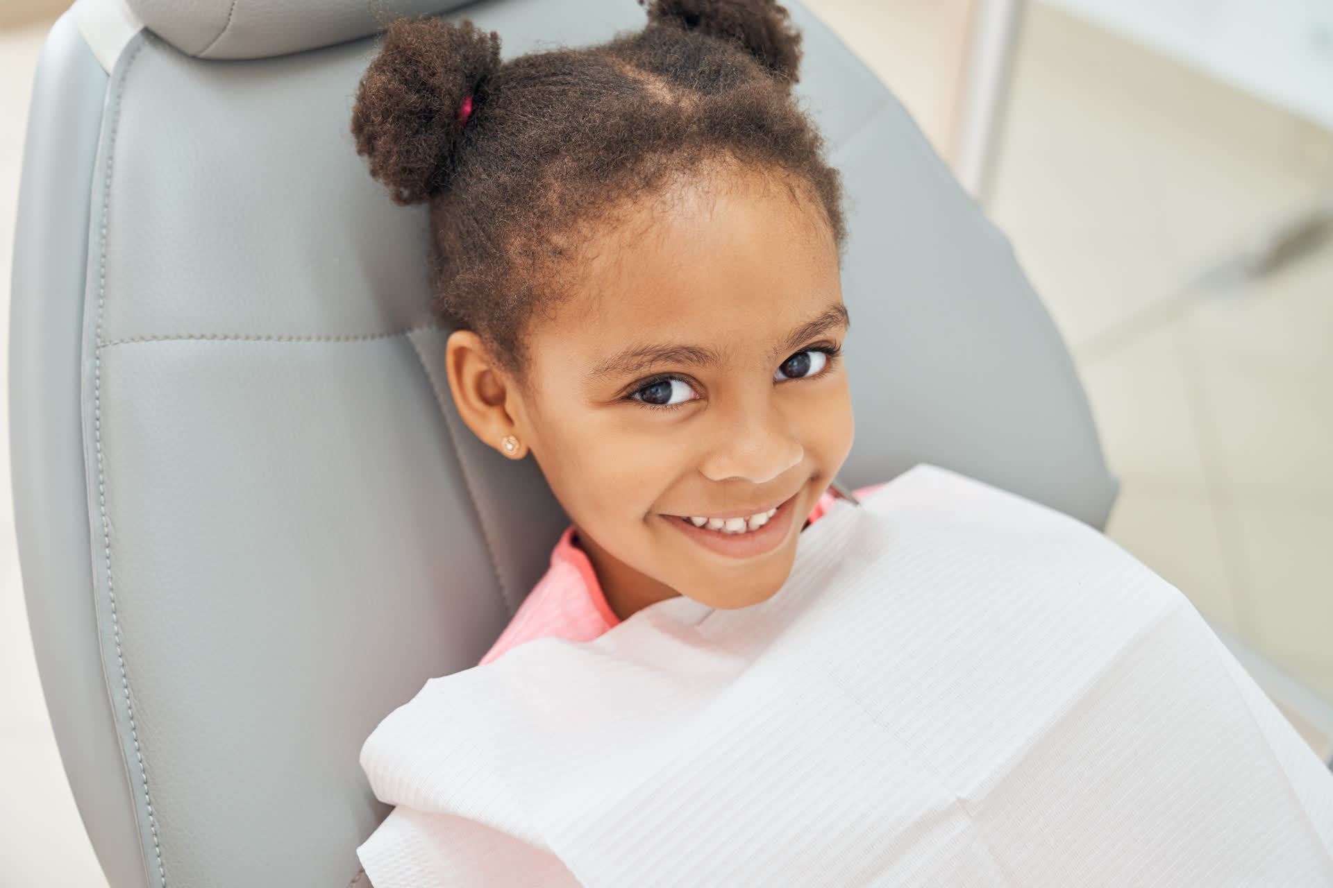 Dental sealant application showing protective coating on back teeth